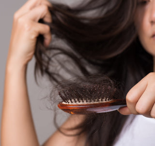 The Best Shampoos for Postpartum Hair Loss — and What Dermatologists Recommend Using Instead