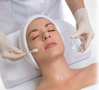 chemical peel skin treatment applied to women